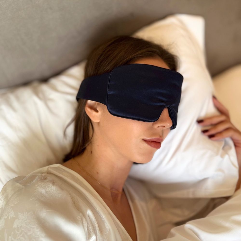 Adjustable dark blue silk sleep eye mask for side, stomach sleeper